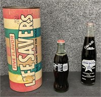 Two Coca-Cola Bottles and Life Saver Piggy Bank