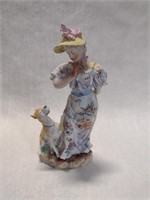 Porcelain Woman with Dog Figurine