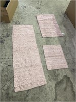 Gently used set of 3 fuzzy bath mats pink.