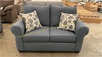 Blue Upholstered Loveseat w/ Floral Pillows