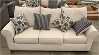 Cream Upholstered Sofa w/ Flora & Striped Pillows