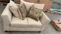 Tan Upholstered Loveseat w/ Pillows