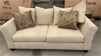 Tan Upholstered Sofa w/ Pillows