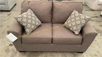 Beige Upholstered Loveseat w/ Pillows