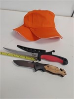 2.   Orange hunting caps. / hunting knife and