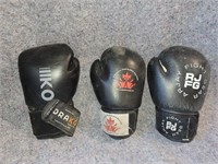 3 mismatched boxing gloves