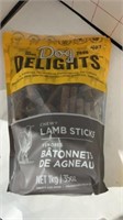 Dog delights, lamb sticks open package