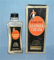Early Esquire leather cream glass bottle