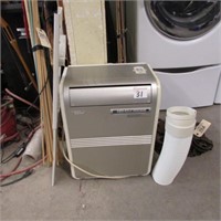 COMMERCIAL COOL AIR CONDITIONER - SIDE HAS DAMAGE