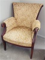 Upholstered arm chair.  Look at the photos for