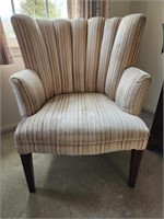 Upholstered arm chair.  Look at the photos for