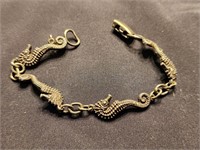 Sterling silver Carl Schon seahorse bracelet.