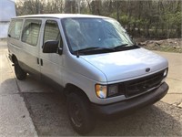 Gray Ford E-250 Cargo Van