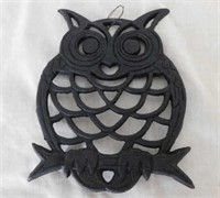 5 cast iron trivets including an owl, 6" x 5"