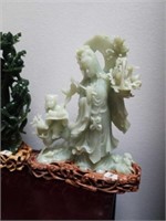 10-in Jade sculpture on wooden base