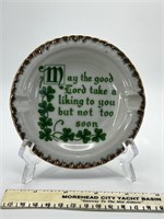 A vintage porcelain ashtray with an Irish verse