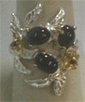 256 - STERLING SILVER RING W/BLACK OPALS (9)