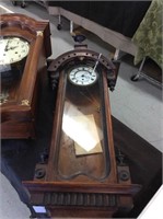 Vintage regulator clock with key and paperwork