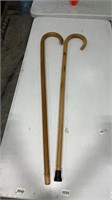 2 wooden walking canes