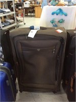 Large delsey suitcase