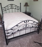 Full size box spring mattress and metal frame.