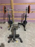 Weight Bench with Several Free Weights