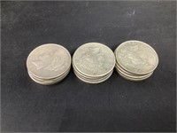 12 - Peace Silver Dollars
