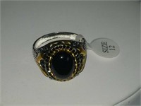 Black gold and silver ring