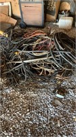 Huge pile of assorted electrical cords. Some very