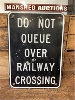 Do Not Queue Over Railway Sign