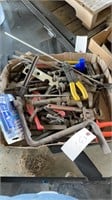 Assorted hand tools. Pliers pipe wrenches snips