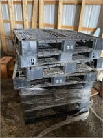 stack of plastic pallets