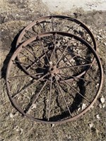 2 sntique steel wheels