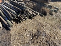 assorted 6' fence posts, big and small,