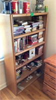 Book Shelf With Books, clocks, coffee Cups, Etc