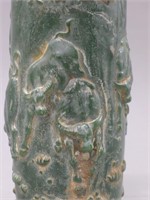 A CHINESE HARDSTONE BRUSH POT CARVED WITH BULLS. .