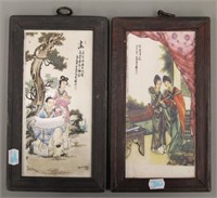 A PAIR OF WOODEN FRAMED CHINESE PLAQUES. 16 X 29 L