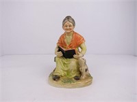 Figurine of Old Woman Reading