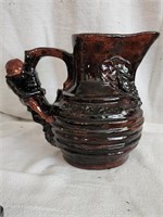 1963 redware art pottery pitcher.   Black