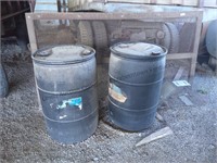 Two black barrels may contain paint thinner one