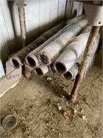Several partial spools of round bale wrap, see