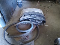 Vintage cart partial silage bag and some hoses