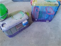 Small pet cages with toys and feeders