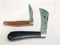 2 Ka Bar folding knives: Hawkbill and model #