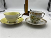 2 Fine porcelain tea cups & saucers