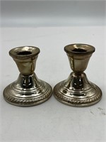 Weighted sterling silver candlesticks