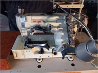 Pegasus W500 sewing machine with conservation