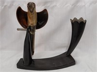 Parrot and vase carved horn  measures 12"w 12"h