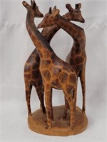 3 Giraffe wood carving 12"h 6"w
