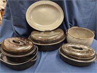 Enamelware: pot, tray, covered pans and pan.
